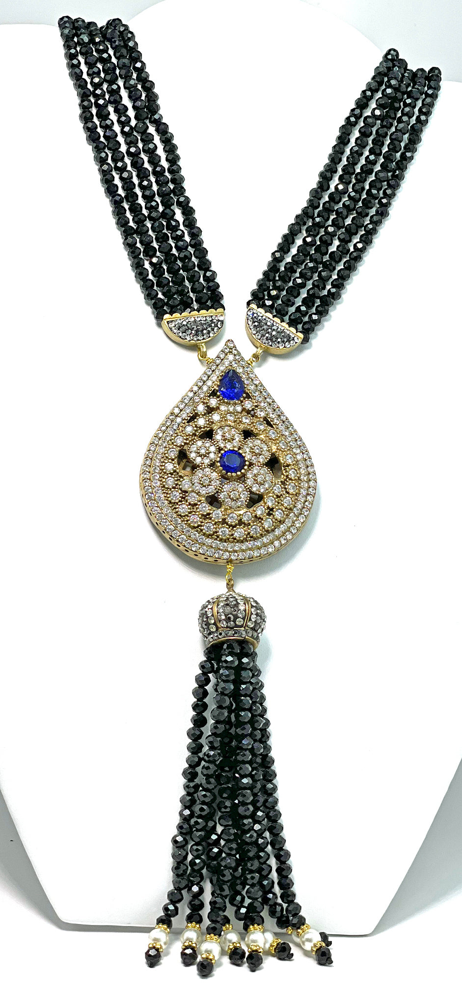 Handmade necklace made of black crystals with large pendant with navy blue color natural gemstone