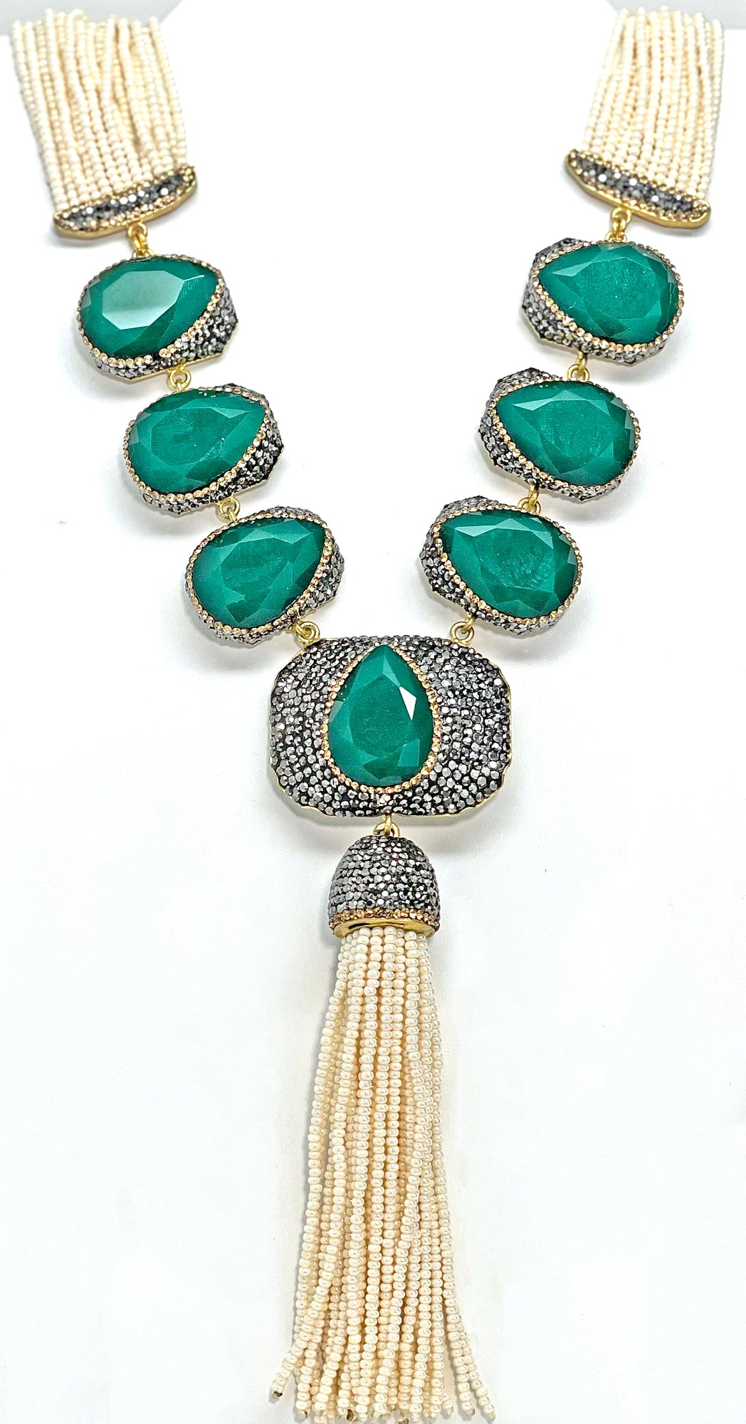 Artisan's necklace with emerald green natural gemstone and crystal. Each natural gemstone and pearl is unique .